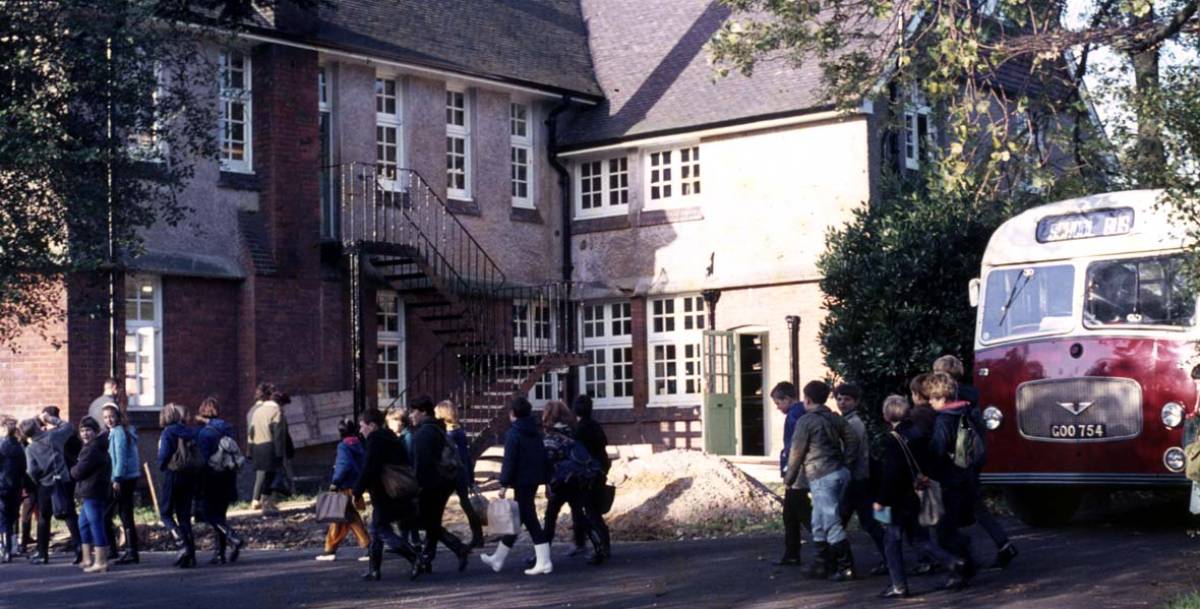 Old image of the hive centre with children outside walking