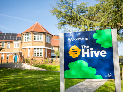 The Hive sign in front of the building